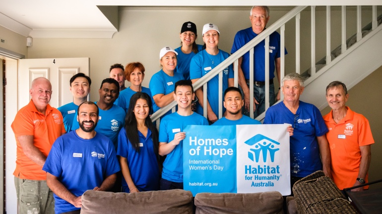 Habitat for Humanity Homes of Hope project completion group photo