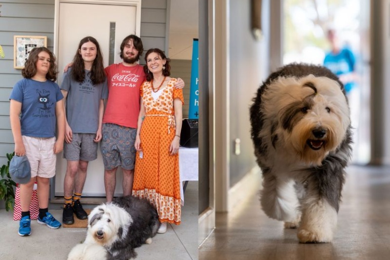 family outside property with dog